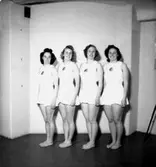 Gymnastik, fyra flickor.