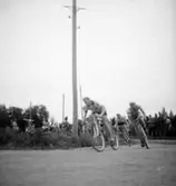 Cykeltävling.
N.A.N.T.