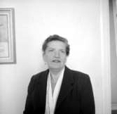 En kvinna, bröstbild.Fru Alvbrant