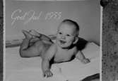Julkort föreställande en baby.Rudolf Rittbergs dotter, 4 månader gammal.
