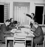 ABF:s styrelse, fem män vid bordet.