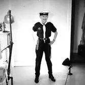 En pojke i sjömansdräkt.
Lasse Eriksson som sjöscout.
Beställare: Sixten Eriksson.