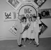 Grupp fyra personer.Konsums jubileum.