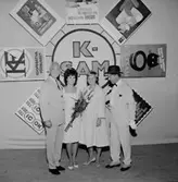 Grupp fyra personer.Konsums jubileum.