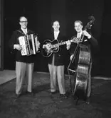 Börje Wizells orkester, tre män med musikinstrument.