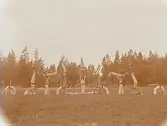 Gymnastikföreningen Athena, gymnastikuppvisning, 18 personer, gruppbild.