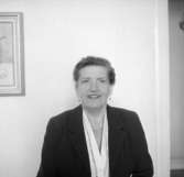 En kvinna, bröstbild.Fru Alvbrant