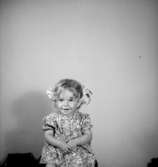 En liten flicka.Polerare Pettersson