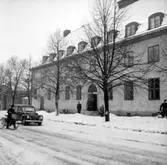 National Kassa Register AB, kontorsmaskiner, bostadshus, en bil.