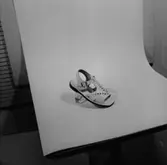 En sko.
Oscaria Skofabrik.