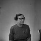 En kvinna, bröstbild.Gustafsson & Görtz personal.