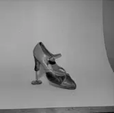 En sko.
Oscaria Skofabrik.