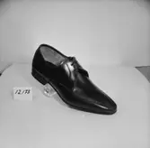 En sko.
Oscaria Skofabrik.