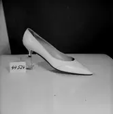 En sko.
Oscaria Skofabrik.