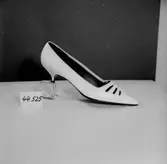 En sko.
Oscaria Skofabrik.