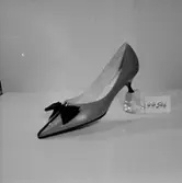 En sko.
Oscaria Skofabrik.