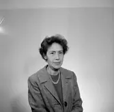 En kvinna, bröstbild.
Örebro Sparbank.