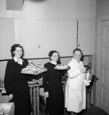 Konsums föreståndare på föreläsning, tre kvinnor.