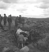 Svennevad, fornlämningar. Grupp.
16 maj 1946