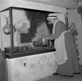 Cajsa Wargs huset, bottenvåningen, interiör, en kvinna.