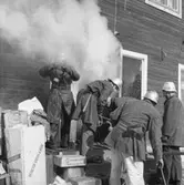 Branden på We-Ges affär i Ställdalen, brandkår, brandsläckning.