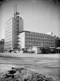 Hörnhuset på fem och tio våningar, polishuset.
Nya Polishuset
AB Bertil Liedströms Byggnads AB.