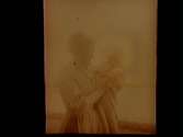 Kvinna med ett barn, 24/1 1909