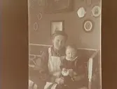 Kvinna och ett barn, 4/4 1911