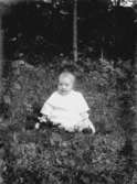 En liten flicka.
Ruth Schlegel, född Eriksson. Hennes föräldrar flyttade till Betania efter Beckmans, år 1919.