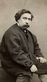 En man.
Thomas Couture (1815-1879), fransk konstnär.
Wilhelmina Lagerholms studerade hos honom i Paris.