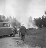 Pyromanbränderna i Kopparberg den 19 juni 1961. Brandsläckning.