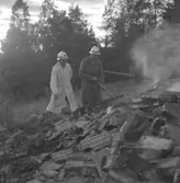 Pyromanbränderna i Kopparberg den 19 juni 1961. Brandsläckning.