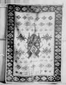 Ryatäcke visat på en utställning