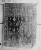 Ryatäcke visat på en utställning