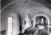 S:t Olofs kyrka. Långhusvalven. Foto från övre orgelläktaren, mot nordost. Mars-april 1958.