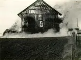 Prästgårdens ladugård brann ner 23/9 1932.