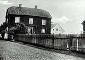 Huset 'Blåsut'/'Kolumbus hus' låg framför nuvarande Olaus Petri kyrka.

Bilden är felvänd.
