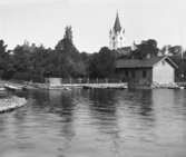 Nora, utsikt från sydöst. Göthlinska gården med den sk Sjöstugan. OBS den gamla strandlinjen (före 1938).