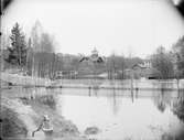 Översvämning, huset med torn Rättviks badanstalt, Dalarna 1909