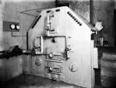 Bild på en oljepanna. Enligt Walter Olsons journal är bilden beställd av Ifö-verken i Bromölla.