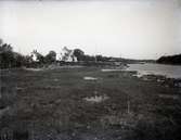 Området innan Jutegatan var byggd. I bakgrunden syns Jutebron. Foto från 1930 talet.