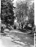 Hästskjuts på väg vid värdshuset i Strömsbergs bruk, Östhammar, Uppland