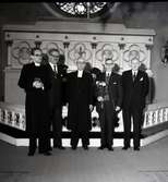 Avtackning av F. kyrkvaktmästaren KG Andersson Bexell 9/3 -1958, med två präster närvarande.