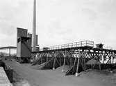 Gasverket i Yttre hamn. Verksamheten pågick där från 1938 till 1966 för att tidigare ha legat vid Klaraborg och vid Hamngatan före branden 1865. Sammantaget producerades det stadsgas i Karlstad i över 100 år.