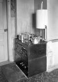 Vedspis med varmvattenberedare installerad av AB Ekonomiska Värme år 1933.