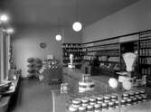 Konsumbutik för specerier med adress Östra Torggatan 6 på en bild tagen 1931.