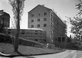 Bildsvit från länslasarettet med omgivningar tagen mellan 1905 och 1961. Nybygge av adminstrationsbyggnad år 1936.