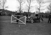 En utställning med fordon från Ford  i och omkring det vid  vid fototillfället före detta ridhuset som låg alldeles väster om Karolinen. Bilden tagen 1939.