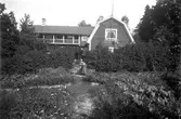 Trädgårdsmästare Larssons ännu kvarstående villa i Gräsdalen på en bild från 1922.