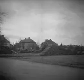 Vedstaplar på Sandgrund under krigsåren. Bilden tagen 1944. Original i dåligt skick.